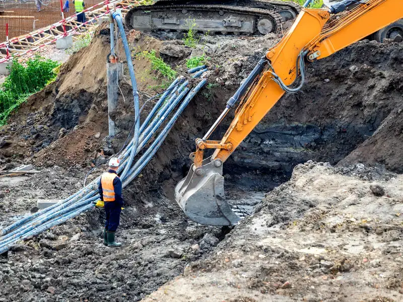 Trenching for utility conduit in Magnolia, Illinois
