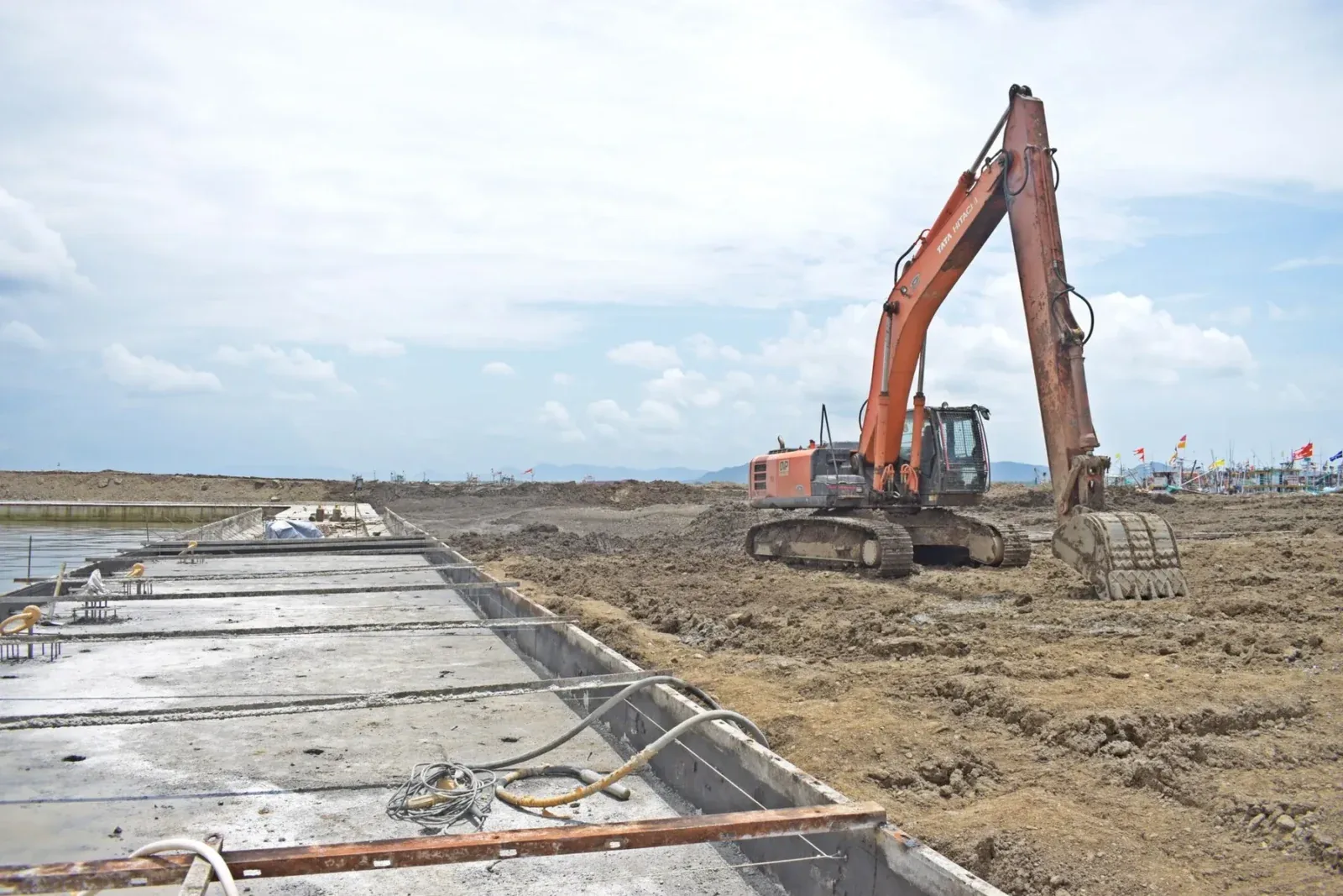 Stock photograph of an excavator completing trench work